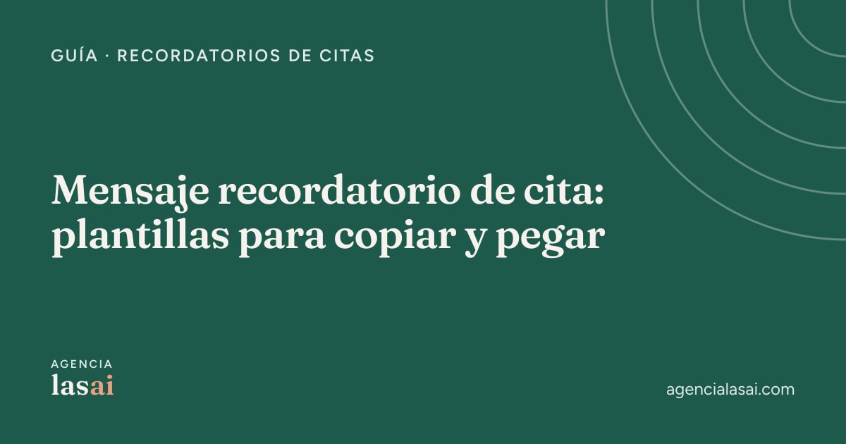 Móvil con un mensaje de WhatsApp recordando una cita junto a una agenda abierta sobre un mostrador